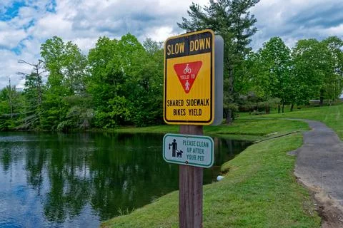 Slow down signage on a trail Foto stock