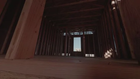 Slow Downward Glide Through Wooden House Framing Interior Wide Angle Stock Footage 334577927