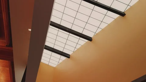 Slow Downward Pan Revealing Skylight Ceiling and Modern Interior Architecture Stock Footage 337661014