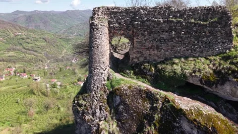 Slow Drone Approach to a Ruined Castle Gate on a Hill in 4K Stock-Footage 339025985