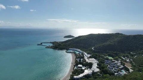 Slow drone drift in the afternoon with a subtle pan left, holding over Hayman Stock-Footage 331024546