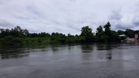 Slow Drone Flight Over Flowing River | 4K ASMR Nature Aerial | Thailand Stock Footage 322823913