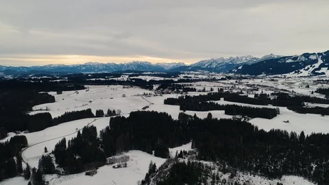Slow Drone Flight over Forest and Snowy Landscape Stock Footage 111756019