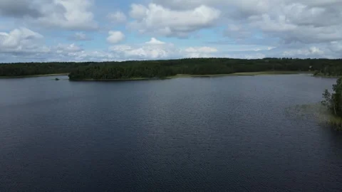 Slow drone flight over a lake in Sweden. Stock Footage 248089760