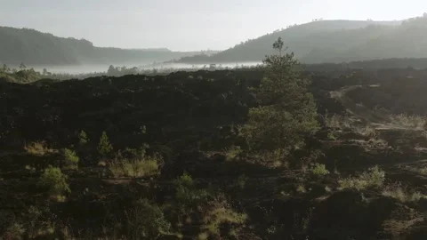 Slow drone flight over lava lake near agung volcano Stock Footage 142988156