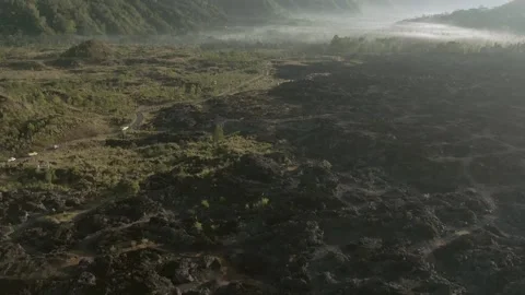 Slow drone flight over lava lake near agung volcano Stock Footage 142988261