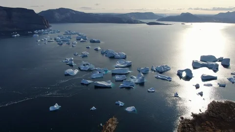 Slow drone fly-by view of Akulleq island, Greenland 動画素材 122497501