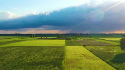 Slow drone flying over springtime fields Stock Footage 154859183