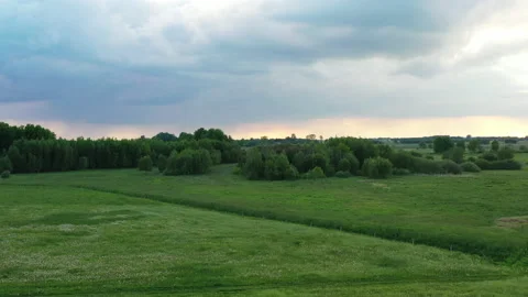 Slow drone flying over springtime fields Stock Footage 156697263