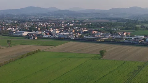 Slow drone forward flyover following freight train toward Fiorenzuola dArda Stock Footage 340155704