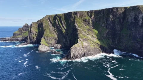 Slow drone orbit along a rugged Irish coastline of Portacloy, Ireland. Stock Footage 342666183