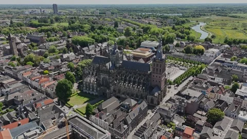 Slow Drone Orbit Left of Gothic European Cathedral in Old City, Sunny Stock Footage 308820994