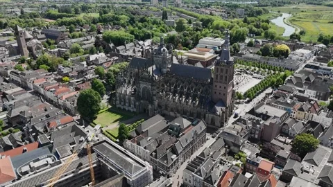 Slow Drone Orbit Left of Gothic European Cathedral in Old City, Sunny 3 Stock Footage 308821068