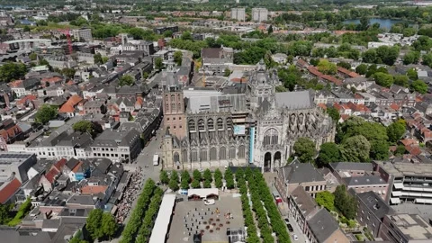Slow Drone Orbit Left of Gothic European Cathedral in Old City, Sunny 4 Stock Footage 308821074