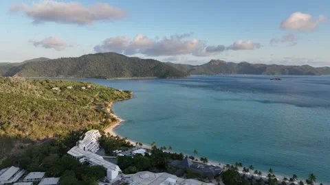 Slow drone orbit right with a gentle pullback in the afternoon, widening from Stock Footage 331025128