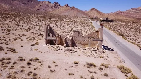 Slow drone over ghost town ruins - old bank Stock Footage 92828980