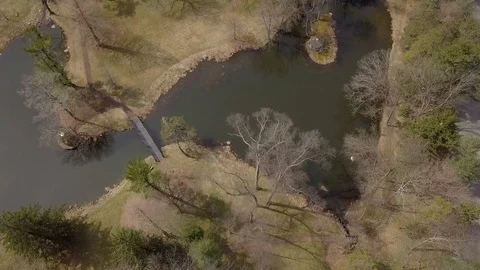 Slow Drone over small lake and trees Stock-Footage 106058585