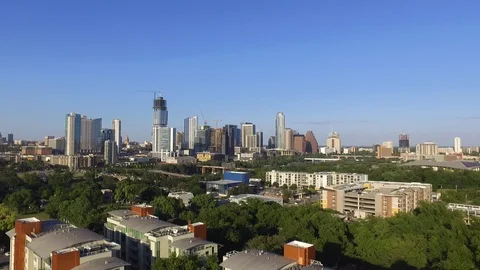 Slow Drone Pan Left Downtown Austin on a Clear Blue Sky Day Stock Footage 89784064