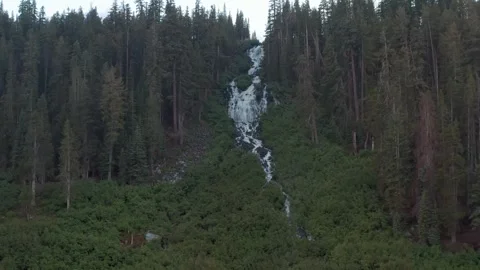 Slow Drone Pull Back Revealing Mountains 스톡 동영상 307730006