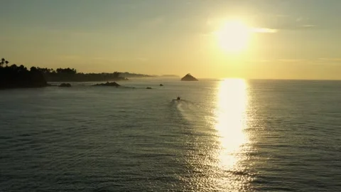 Slow drone shot into sunset Video stock 245017619