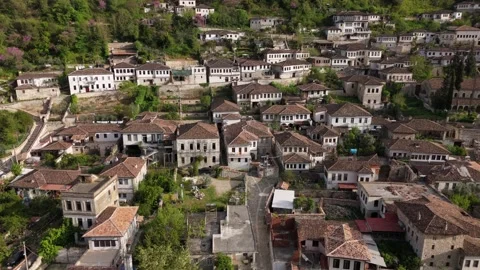 Slow Drone Slide Right over Historic Houses and Greenery in Berat Stock-Footage 335486602