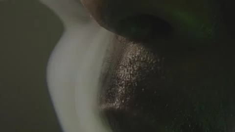 Slow Exhale: Vape Cloud in Cinematic Light Video stock 311363307