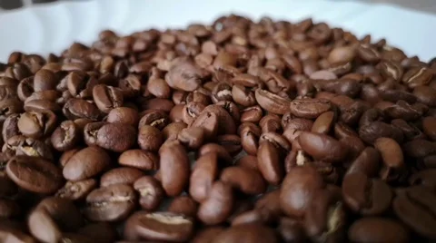 Slow fall of coffee beans Stock Footage 125639525