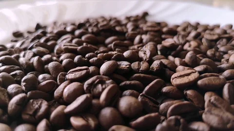 Slow fall of coffee beans Stock Footage 125639592