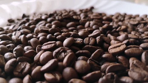 Slow fall of coffee beans Stock Footage 125639840