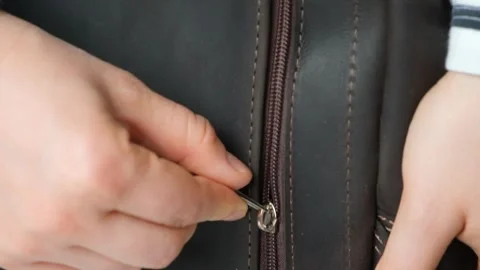 Slow Fastening Of Leather Backpack Plastic Zipper Stock Footage 292924478