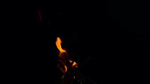 Slow fire flame burning and glowing on dark night screen background Stock Footage 247205990