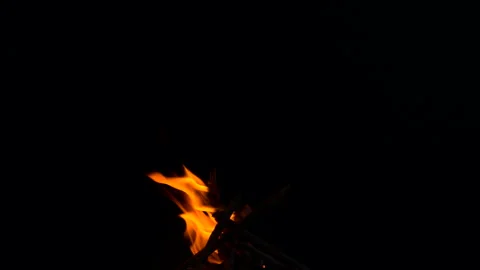 Slow fire flame burning and glowing on dark night screen background Stock Footage 247206250