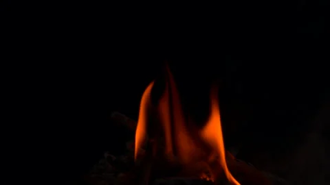 Slow fire flame burning and glowing on dark night screen background Stock Footage 247207451