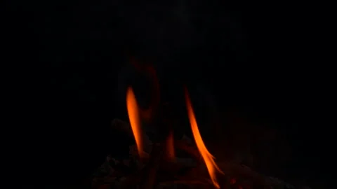 Slow fire flame burning and glowing on dark night screen background Stock Footage 247207630