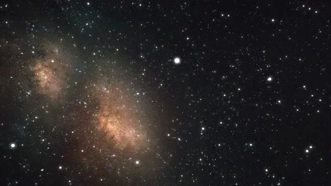 Slow flight to a distant glowing galaxy through many stars and constellations Stock Footage 159743378