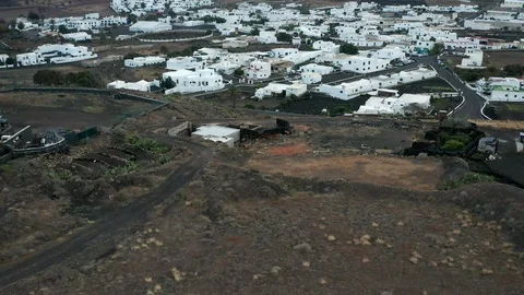 Slow flight over city filled with white buildings Stock Footage 104422178