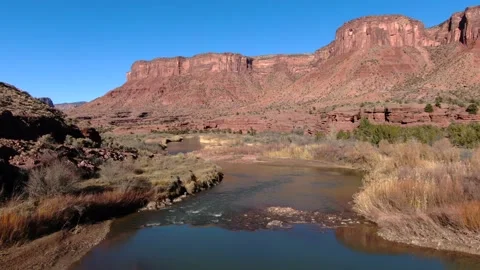 Slow flight over the Dolores River in Gateway Colorado Video stock 325148911
