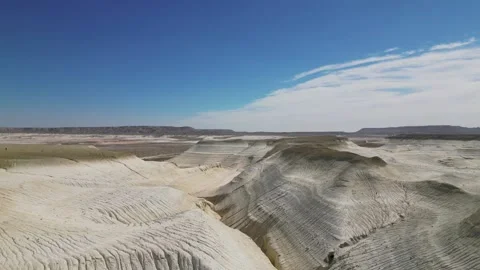 Slow flight over mountain tops and gorge Stock Footage 237695944