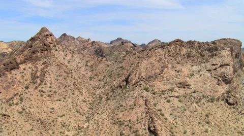 Slow flight over rocky desert hills Stock Footage 59538038