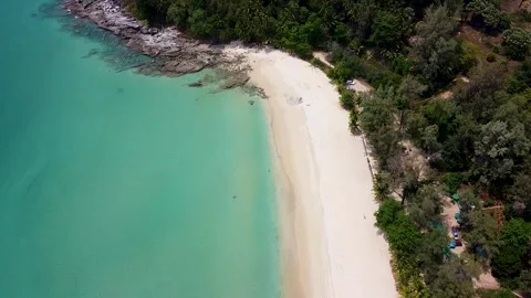 Slow flight over a sandy beach in the tropics, aerial view of the sea bay Video stock 171797990