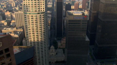 Slow flight over skyscrapers toward construction site in Los Angeles. Shot in Stock Footage 59511716