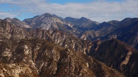Slow Flight Through the Mountain Landscape of the Angeles National Forest in CA 動画素材 96677308
