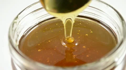 Slow-flowing honey Stock Footage 11132186