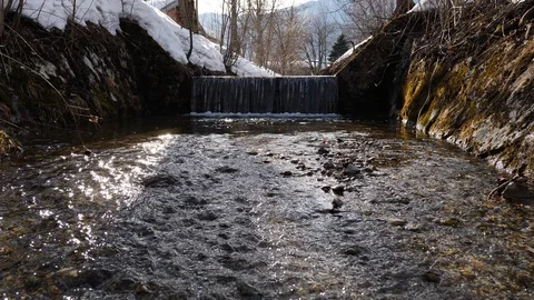 Slow flowing river and a nice calm waterfall Stock Footage 103614730