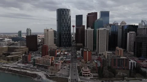 Slow Fly Down Over Calgary Tower and Centre Street Downtown Skyline Stock Footage 336354694