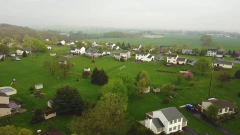 Slow fly over of small Lancaster PA community near Elizabethtown Stock Footage 113528336