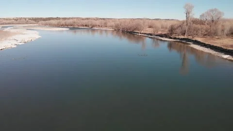 Slow fly over Yellowstone River Stock Footage 310572470