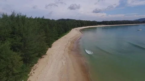 Slow flying over a beach with waves Stock Footage