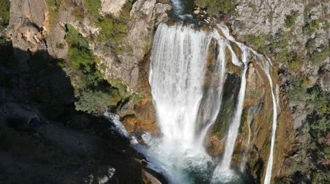 Slow flying over the waterfall Видео 58668862