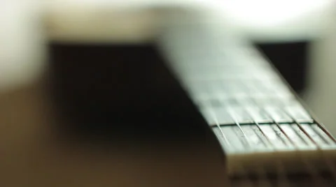 Slow focus pull of guitar Video stock 38550739